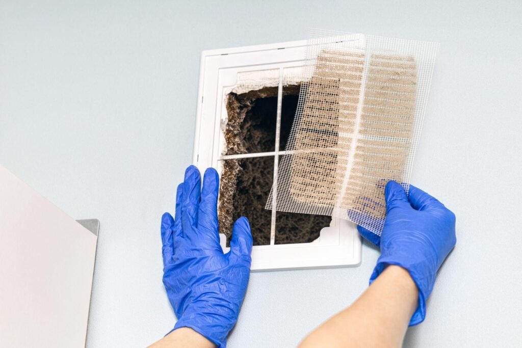 cleaning air vents and registers during duct cleaning service