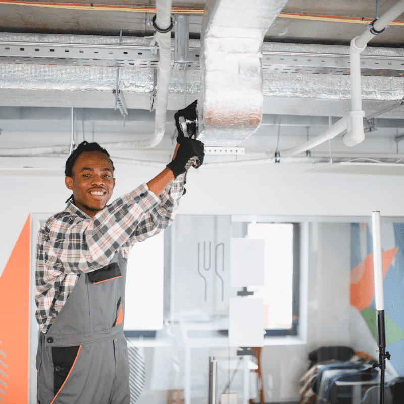 Commercial duct system maintenance inside office building